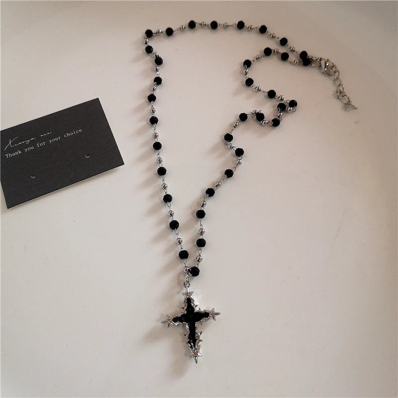 BLACK CROSS NECKLACE®